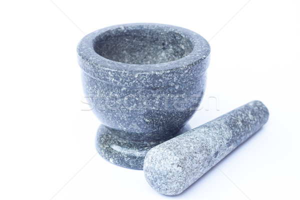 Stone mortar and pestle on white background Stock photo © punsayaporn