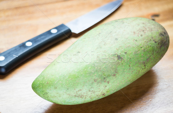 Green mango prepare for peeling Stock photo © punsayaporn