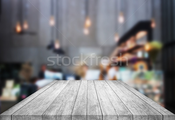 Black And White Tabletop Wooden With Blurred Cafe Background Stock