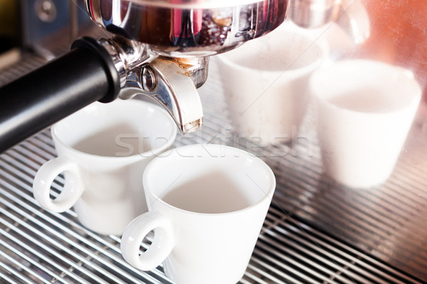 Prepares espresso in  coffee shop with vintage filter style Stock photo © punsayaporn