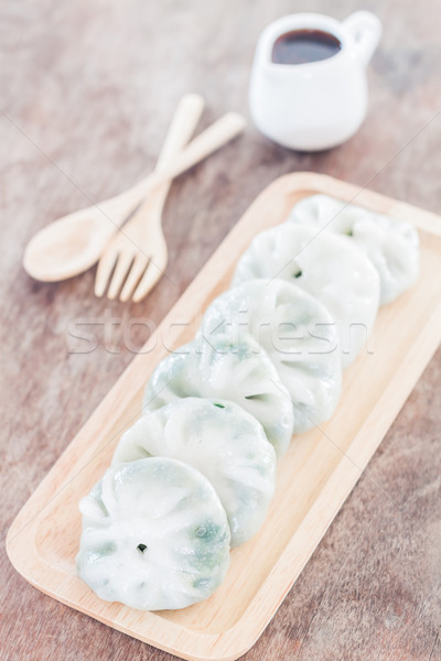 Chinese leek steamed dessert on wooden table Stock photo © punsayaporn