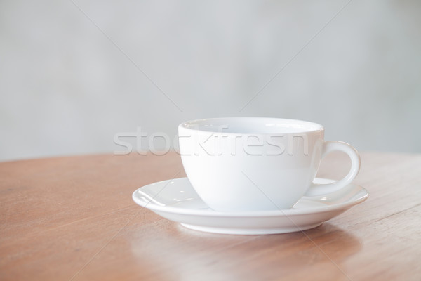 White coffee cup on wooden table with clipping path Stock photo © punsayaporn