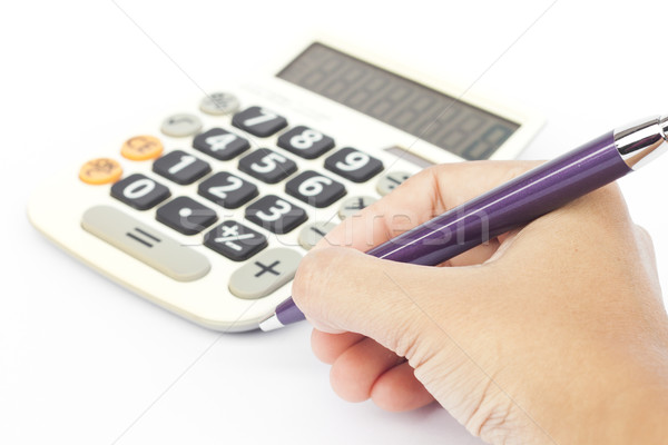 Calculator with hand isolated on white background Stock photo © punsayaporn