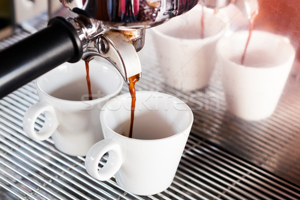 Prepares espresso in  coffee shop with vintage filter style Stock photo © punsayaporn