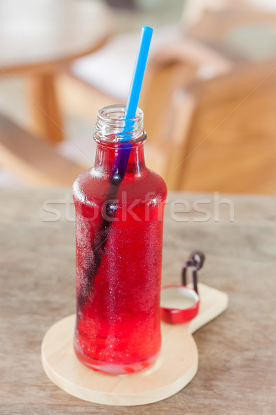 ストックフォト: 赤 · シロップ · ボトル · 木製 · プレート · 在庫