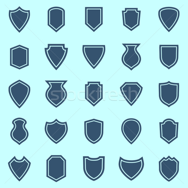 Shield color icons on blue background Stock photo © punsayaporn