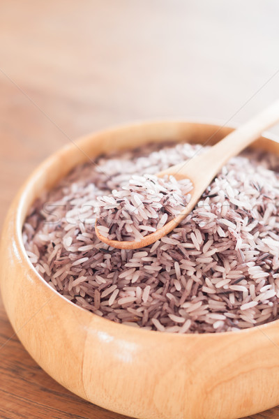 Berry rice in wooden bowl Stock photo © punsayaporn