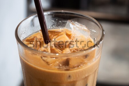 Cold glass with cola and ice cubes Stock photo © punsayaporn