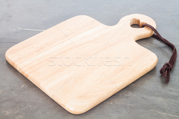 Wooden plate on grey background Stock photo © punsayaporn