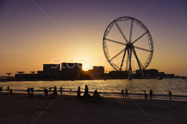 Dubai rueda puesta de sol mar marco viaje Foto stock © PureSolution