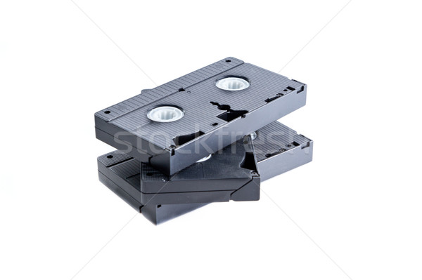 Stock photo: Pile of videotapes on  white background.