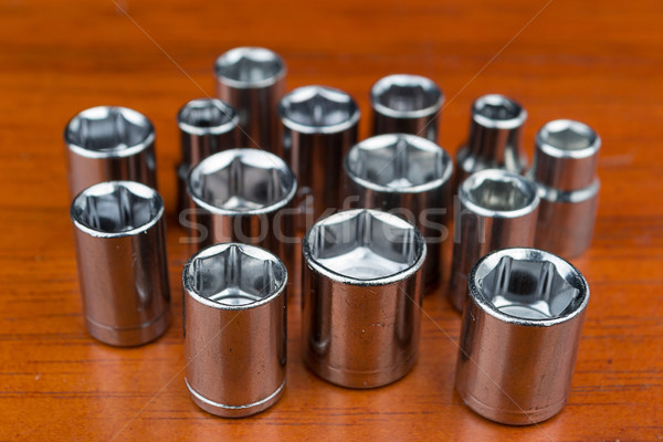 Set of chromeplated wrench dadoes, on wood Stock photo © pxhidalgo
