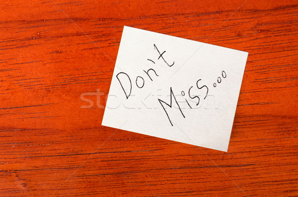 Dont Miss - Post it Note on Wood Background Stock photo © pxhidalgo