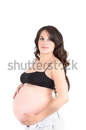 Tineri frumos femeie gravida lung parul inchis la culoare în picioare Imagine de stoc © pxhidalgo