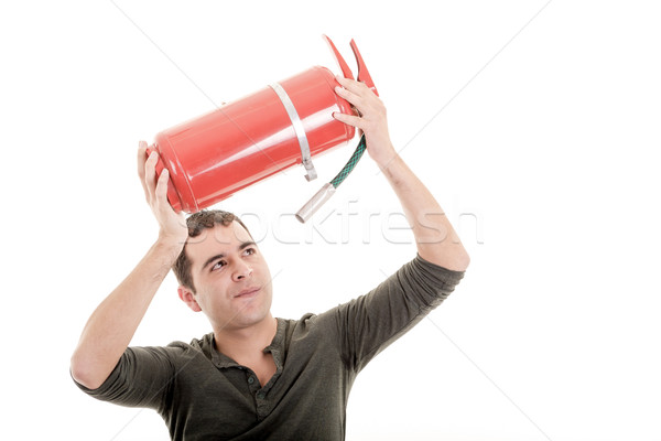 Business man holding fire extinguisher  with empty space for your text Stock photo © pxhidalgo