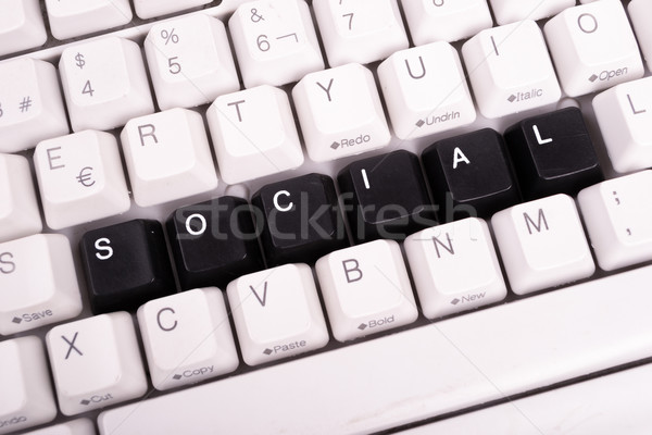 Word Social written with black keys on computer keyboard. Stock photo © pxhidalgo