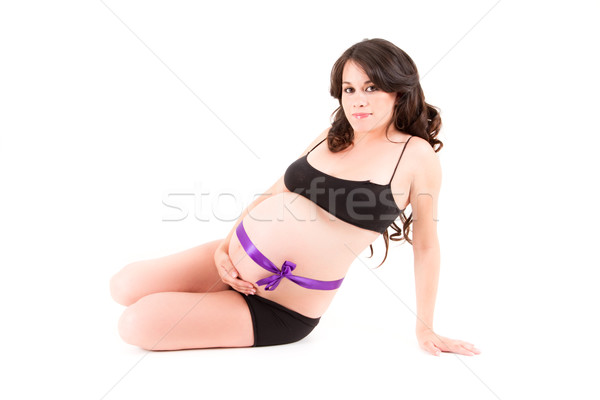 Young beautiful pregnant woman with long dark hairsitting Stock photo © pxhidalgo