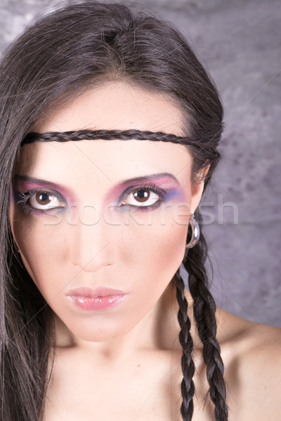 Hippie girl with purple makeup and breaded hair on forehead Stock photo © pxhidalgo