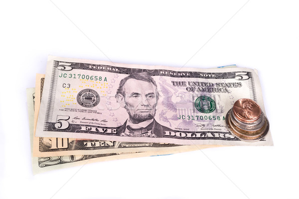 Several stacks of American coins with some dollar bills. Stock photo © pxhidalgo