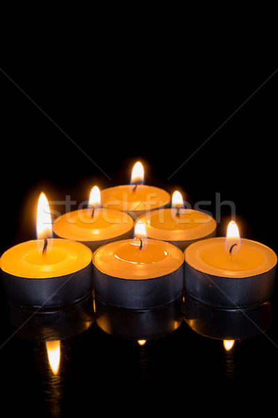 candle triangle on a black background Stock photo © pxhidalgo