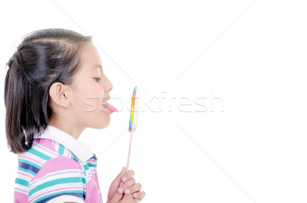 Cute hiszpańskie dziewczynka duży cukierek Zdjęcia stock © pxhidalgo