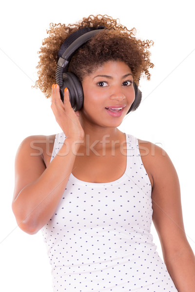 Afro woman listening music. Stock photo © pxhidalgo