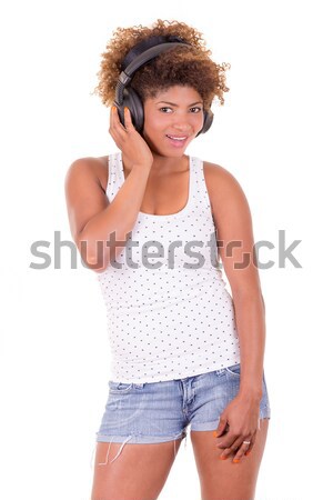 Afro woman listening music. Stock photo © pxhidalgo