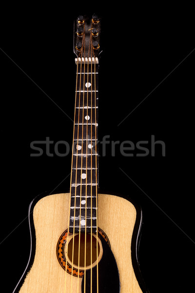Music concept. guitar crop under beam of light Stock photo © pxhidalgo
