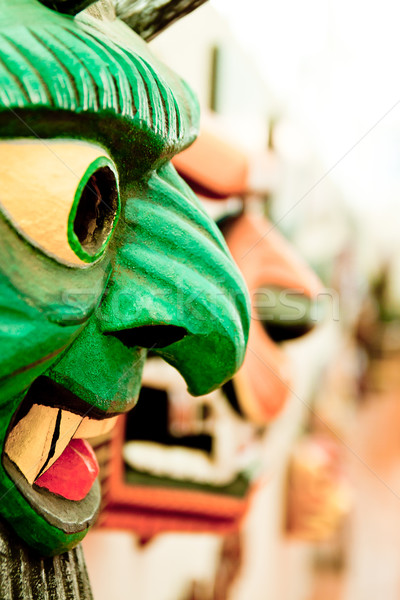 Colorfully painted wooden South American mask Stock photo © pxhidalgo