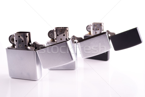 Silver metal zippo lighters on white Stock photo © pxhidalgo