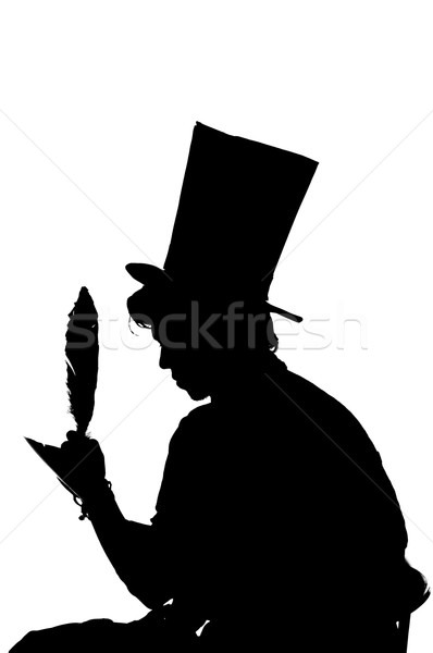 Stock photo: silhouette man sitting on a stool while writing