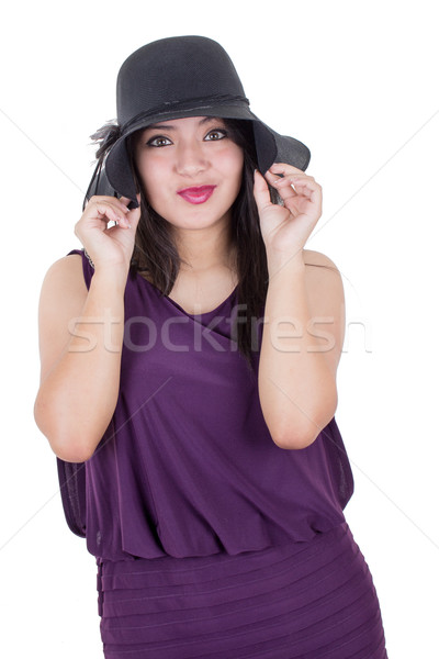 Stock photo: Beautiful hispanic girl wearing a  hat smiling isolated on white