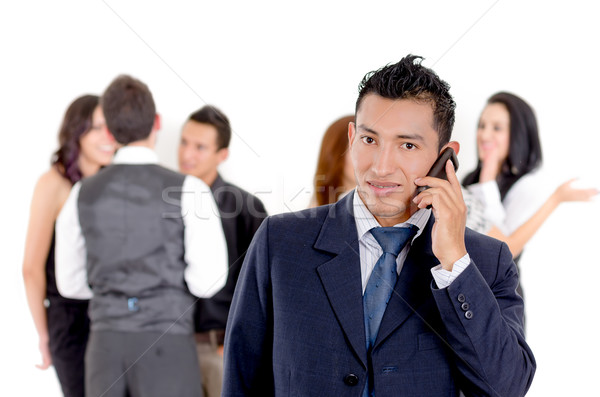Businessman using a cellphone with peers Stock photo © pxhidalgo