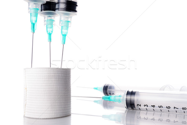 hypodermic needle and gauze, white background Stock photo © pxhidalgo