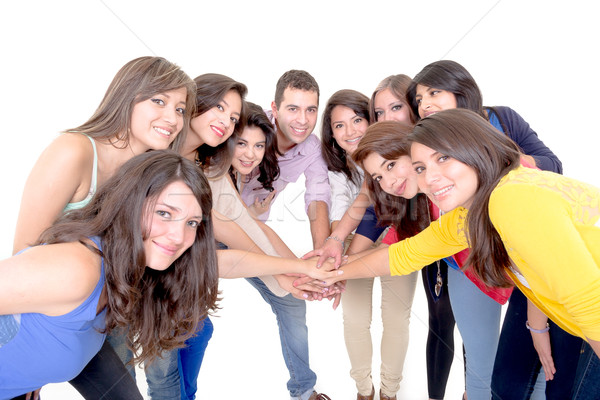 Stock photo: Group of happy people, joining hands