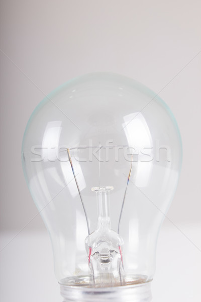 Clear light bulb with filament showing close up Stock photo © pxhidalgo