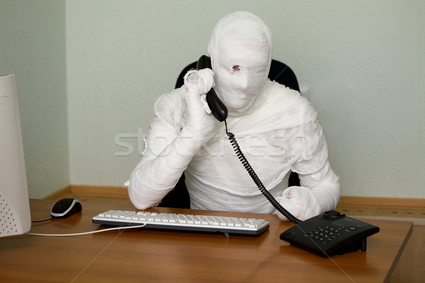 Businessman mummy with telephone Stock photo © pzaxe