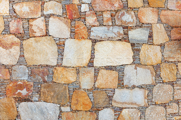 Background - a wall made ​​of natural stone Stock photo © pzaxe
