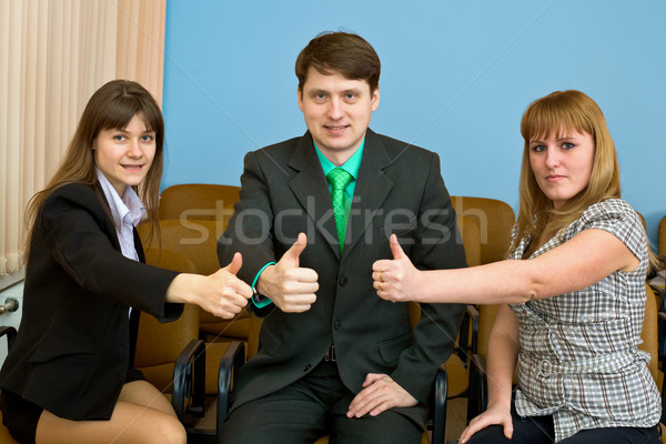 Team of businessmen show thumb up Stock photo © pzaxe