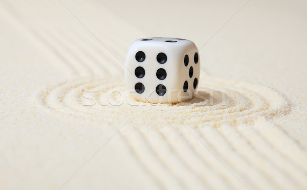 Dice on sand in rock garden Stock photo © pzaxe