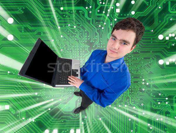 People with laptop on electronic green background Stock photo © pzaxe