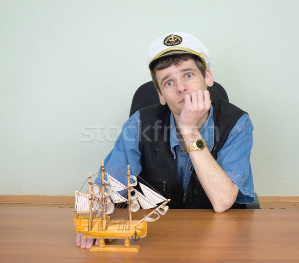 Man with model of a sailing vessel Stock photo © pzaxe