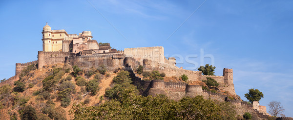 Domed tower and fortified wall of Kumbhalgarh Fortress near Udai Stock photo © pzaxe