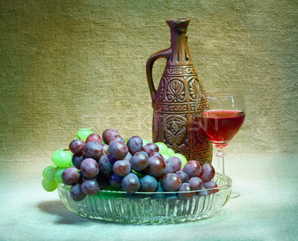 Raisins bouteille verre vin toile fruits Photo stock © pzaxe