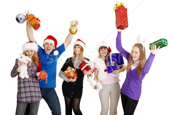 Happy company with New Year's gifts in hands Stock photo © pzaxe