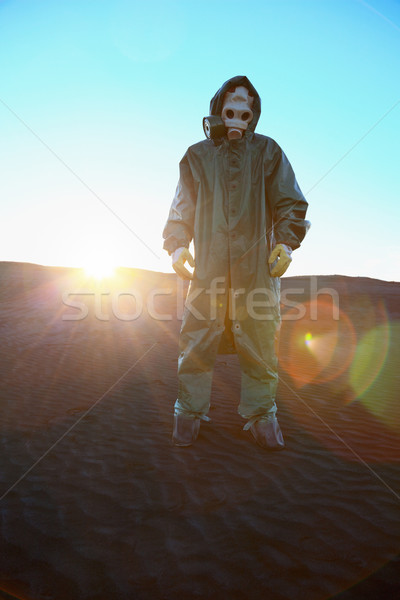 Man in protective suit and rays of sun Stock photo © pzaxe