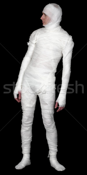 Guy in bandage upright on a black Stock photo © pzaxe