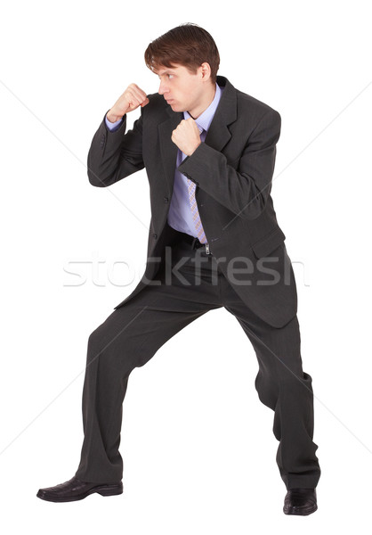 Businessman  in boxing fighting stance Stock photo © pzaxe