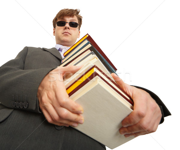 Man in dark glasses holding a books Stock photo © pzaxe