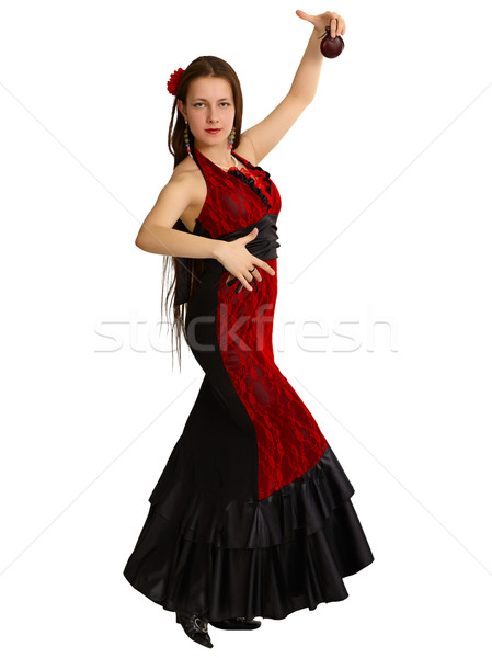 A young girl performs Spanish dance with castanets Stock photo © pzaxe